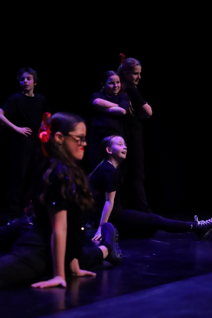 A group of young dancers on stage